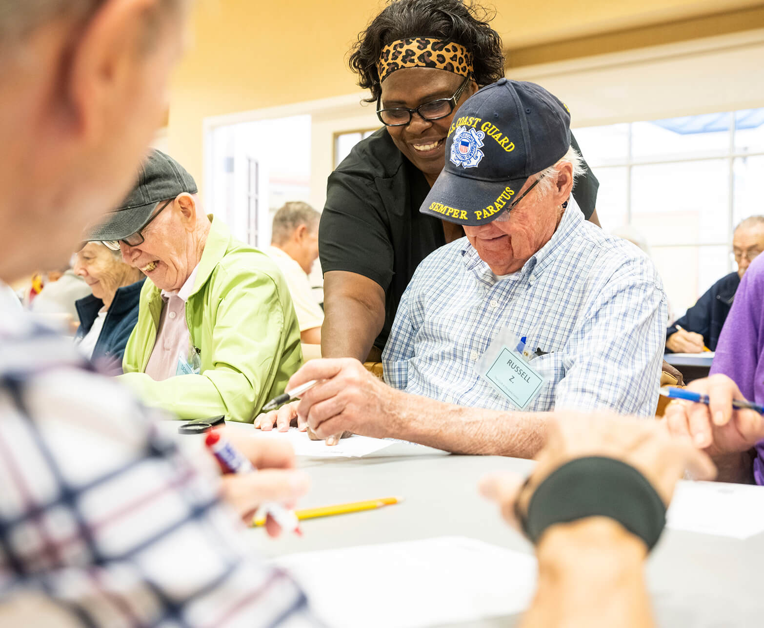 Woman helping elderly