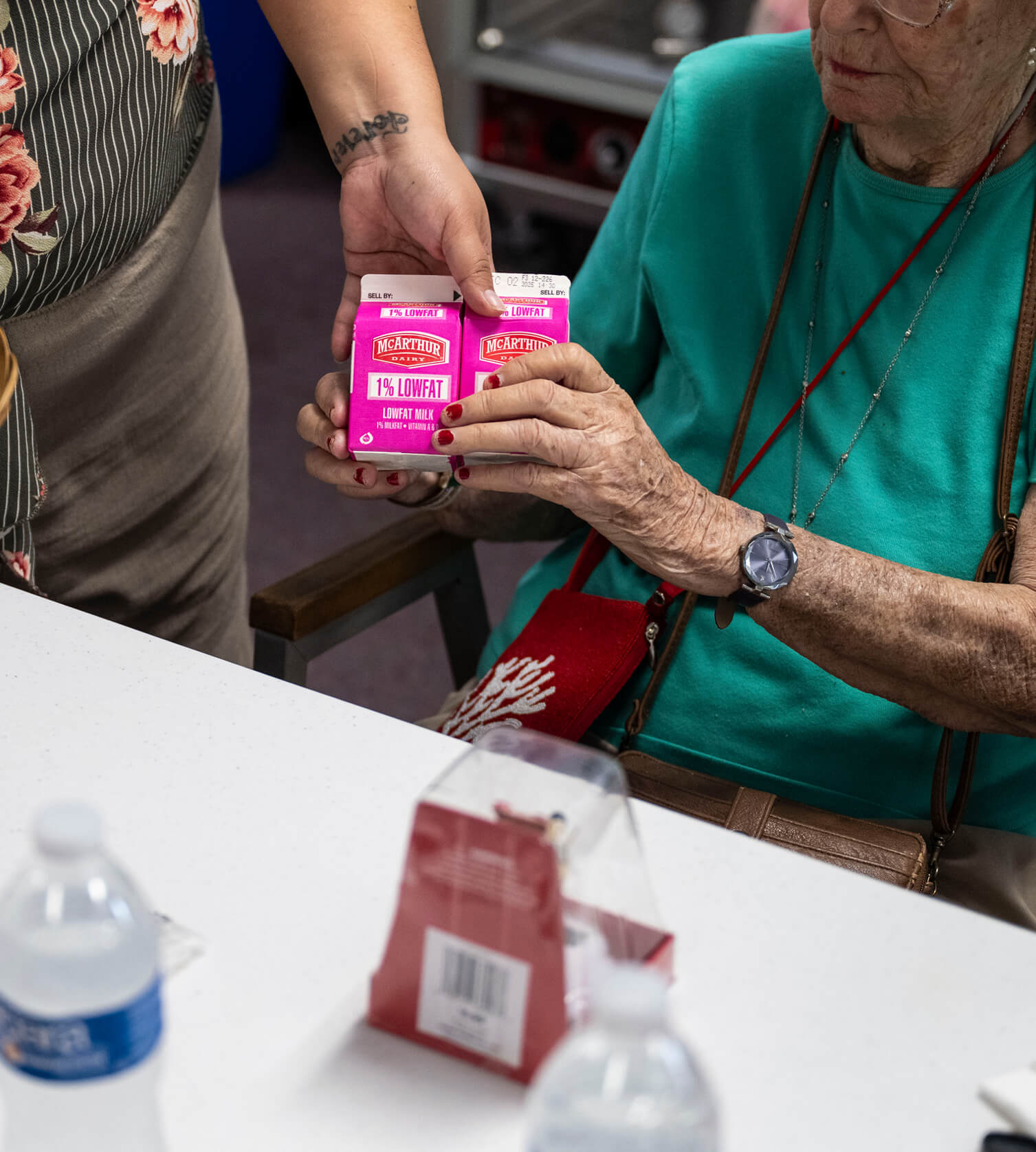 Woman giving lowfat milk